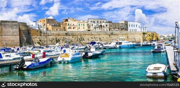 Summer vacation in Puglia, Otranto old town, view with castle and marine. South of Italy. Italian summer holidays. Otranto town in Puglia