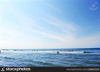 summer vacation on beach sea shore.people relaxing by sea