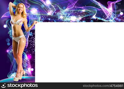 Summer vacation. Young attractive blond in bikini holding blank banner