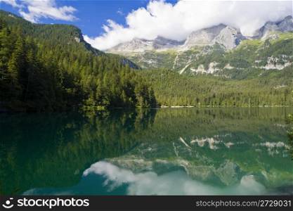 summer view of a beautiful lake in Italian alps