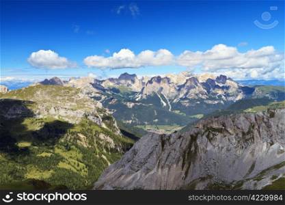 summer view of Monzoni valley with Catinaccio mount on background, Italian Dolomites