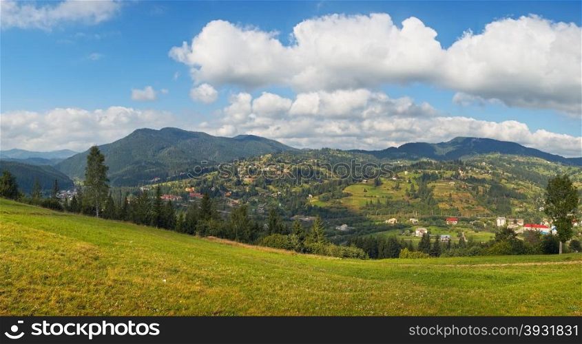 Summer view of mountain village outscirts (Slavske village, Ukraine, Carpathian Mts).