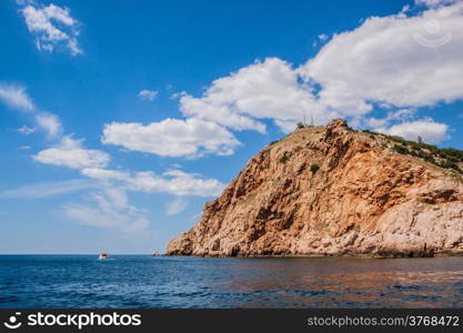 Summer view seacoast. Warm sea and beautiful nature. Sudak beach. Black Sea, Ukraine