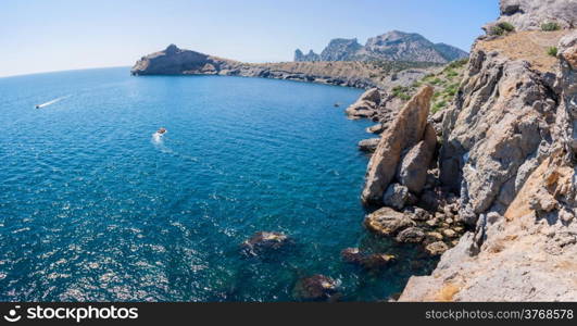 Summer view seacoast. Warm sea and beautiful nature. Sudak beach. Black Sea, Ukraine