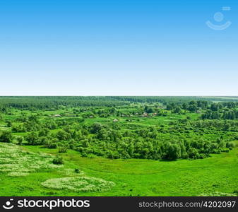 Summer village landscape at sunny day