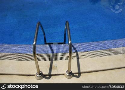 summing pool blue water detail in summer time