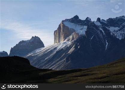 Summit of mountains Torres del Paine covered with snow in South America