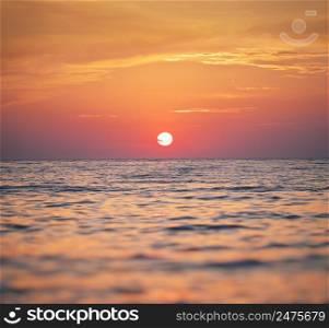 Sun and sea sunset surface background. Abstract light way to the sun. Nature composition.