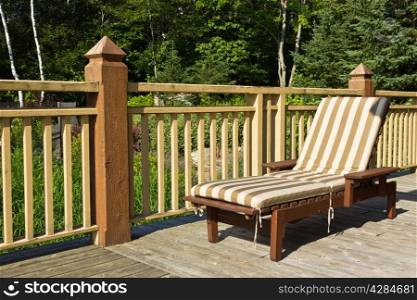 Sun chair on a wooden deck