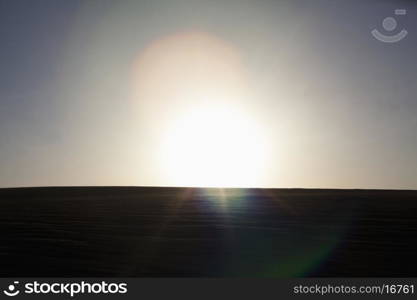 Sun coming down over a sand dune, no people, landscape, lens flare