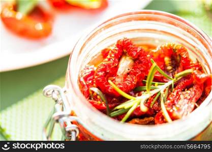 sun dried tomatoes in a glass jar