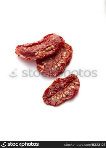 Sun Dried tomatoes in the sunshine on white