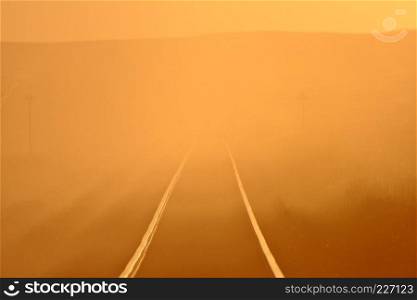 Sun glare along railroad tracks