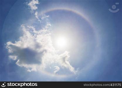 Sun halo in blue sky with cloud. Dream, miracle and amazing nature background.