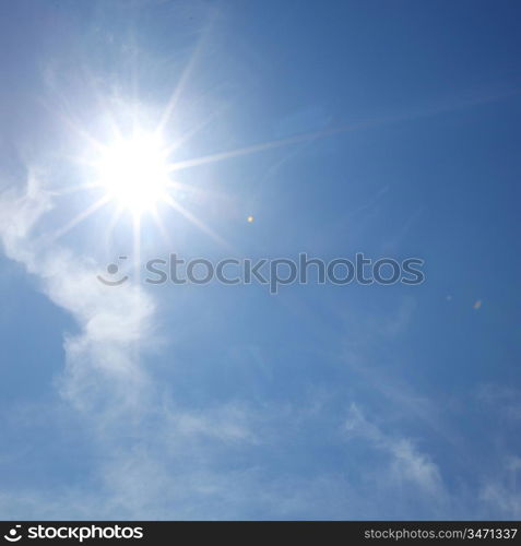 sun in blue day sky