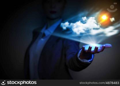 Sun in hand. Image of businessperson holding sun in palm