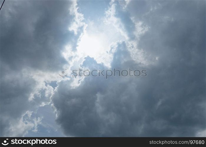 Sun light and blue cloudy sky background