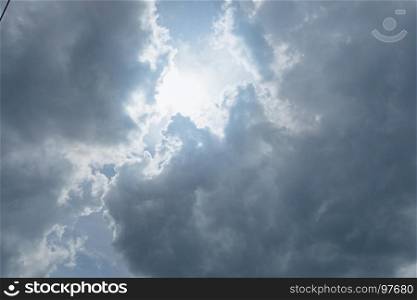 Sun light and blue cloudy sky background