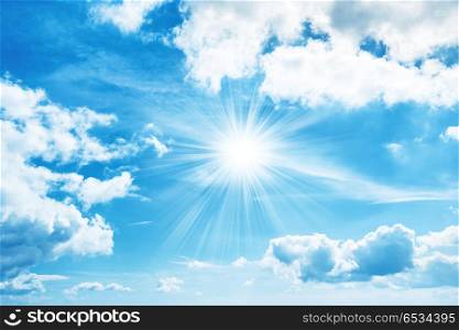 Sun on blue sky. Sun on sky with white clouds for nature background
