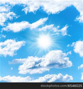 Sun on blue sky with clouds. Sun on blue sky with clouds as nature background