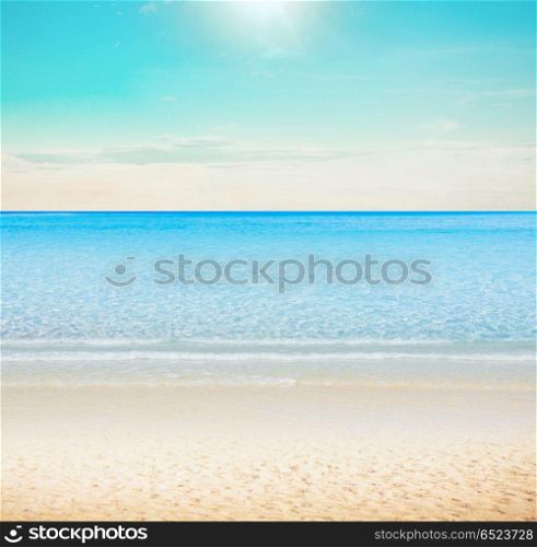 Sun over tropical beach. Sun over tropical beach. Summer vacations landscape. Sun over tropical beach