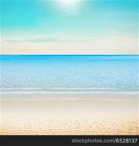 Sun over tropical beach. Sun over tropical beach. Summer vacations outdoor scene. Sun over tropical beach