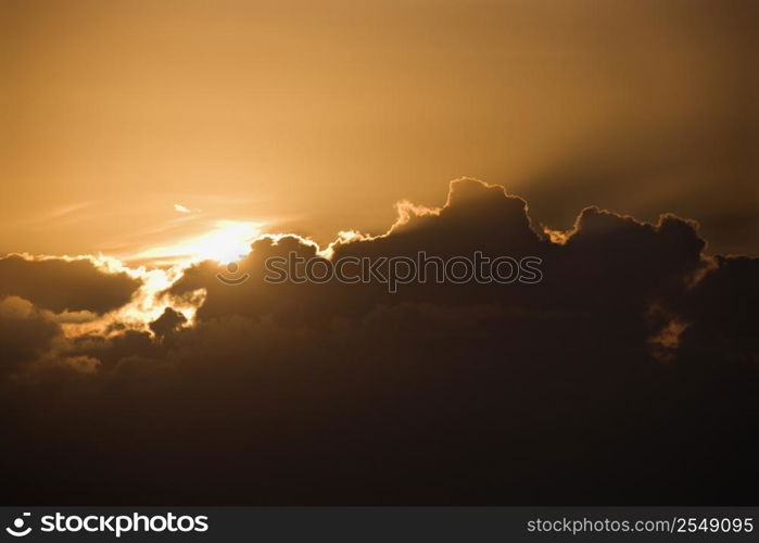 Sun peeking through cloud.