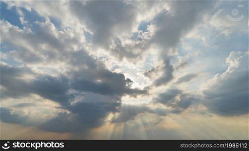 Sun ray. Sunset sky. Abstract nature background. Dramatic blue with orange colorful clouds in twilight time.