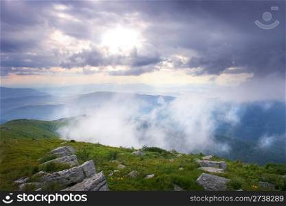 Sun rays through the cloudy sky. Carpathian Mountains 2