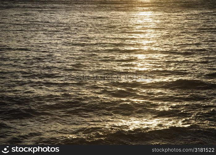 Sun reflected on water of Pacific ocean.