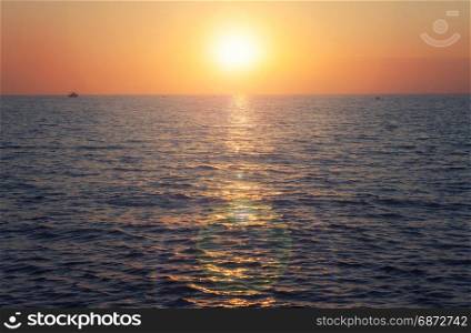 Sun rising over ocean horizon, Florida, USA
