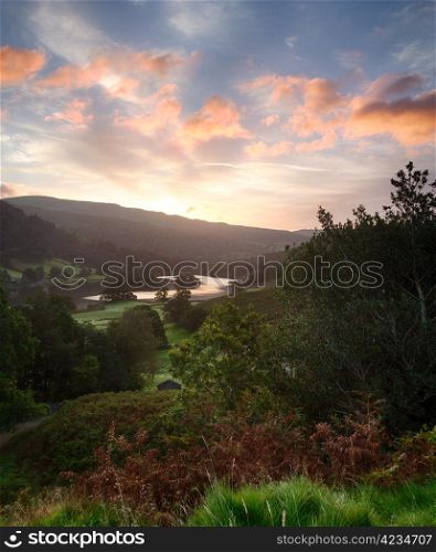 Sun rising over the mountains around Rydal Water in Lake District
