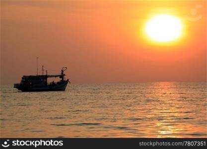 Sun, sea and fishing boat in Koh Chang island, Thailand