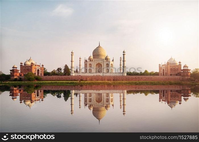 Sun set at Taj Mahal seen from Mehtab Bagh reflect on Yamuna river, an ivory-white marble mausoleum on the south bank of the Yamuna river in Agra, Uttar Pradesh, India. . Sun set at Taj Mahal seen from Mehtab Bagh reflect on Yamuna river.