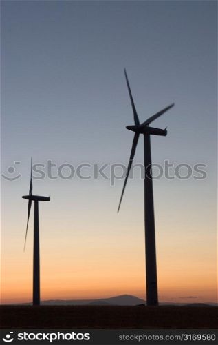 Sun Setting On Windmills
