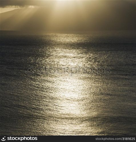 Sun shining on Pacific ocean.