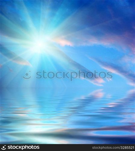 sun, sky, clouds and water with ripples
