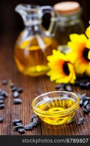 sunflower oil and sunflower seeds on a table