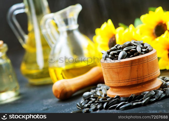 sunflower seed in bowl and on a table