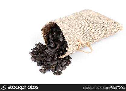 sunflower seeds in hessian sack isolated on white background