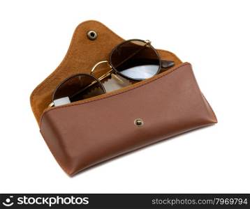 Sunglasses in brown leather case. Isolate on white.