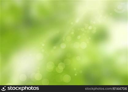 Sunlight and bokeh lights on a green background