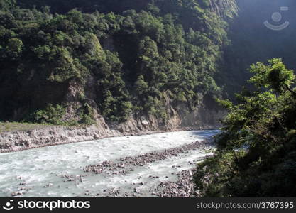 Sunlight and mountain river in Nepal