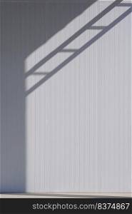 Sunlight and shadow of cable ladder on gray sandwich panel of cold storage wall in freezer warehouse industry area