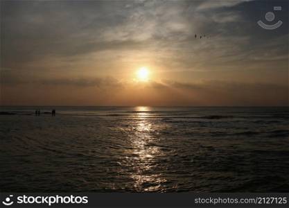 Sunlight and the morning sun on the coast,Seaside natural scenery in Phetchaburi Province, Thailand.