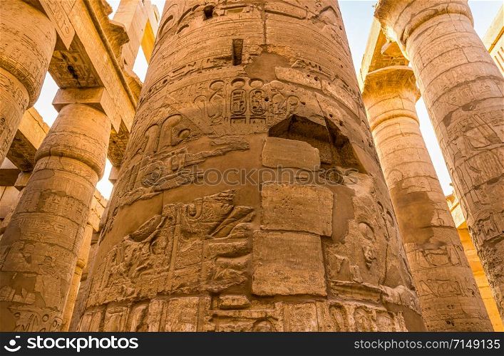 Sunlight over great columns of Karnak Temple in Luxor, Egypt. Sunlight over columns in Karnak