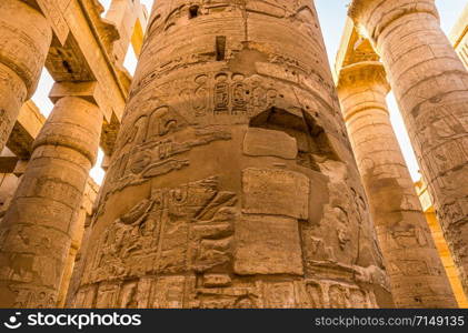 Sunlight over great columns of Karnak Temple in Luxor, Egypt. Sunlight over columns in Karnak