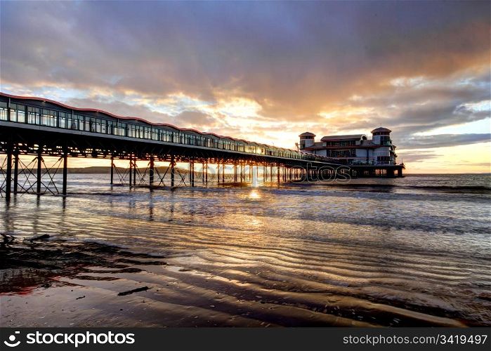Sunlight through the wooden pier