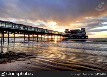 Sunlight through the wooden pier