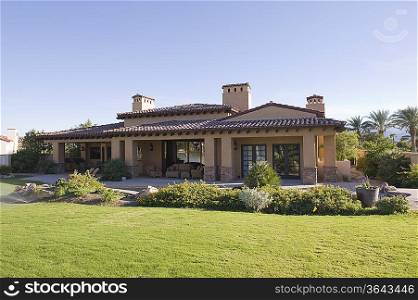 Sunlit garden exterior of Palm Springs home